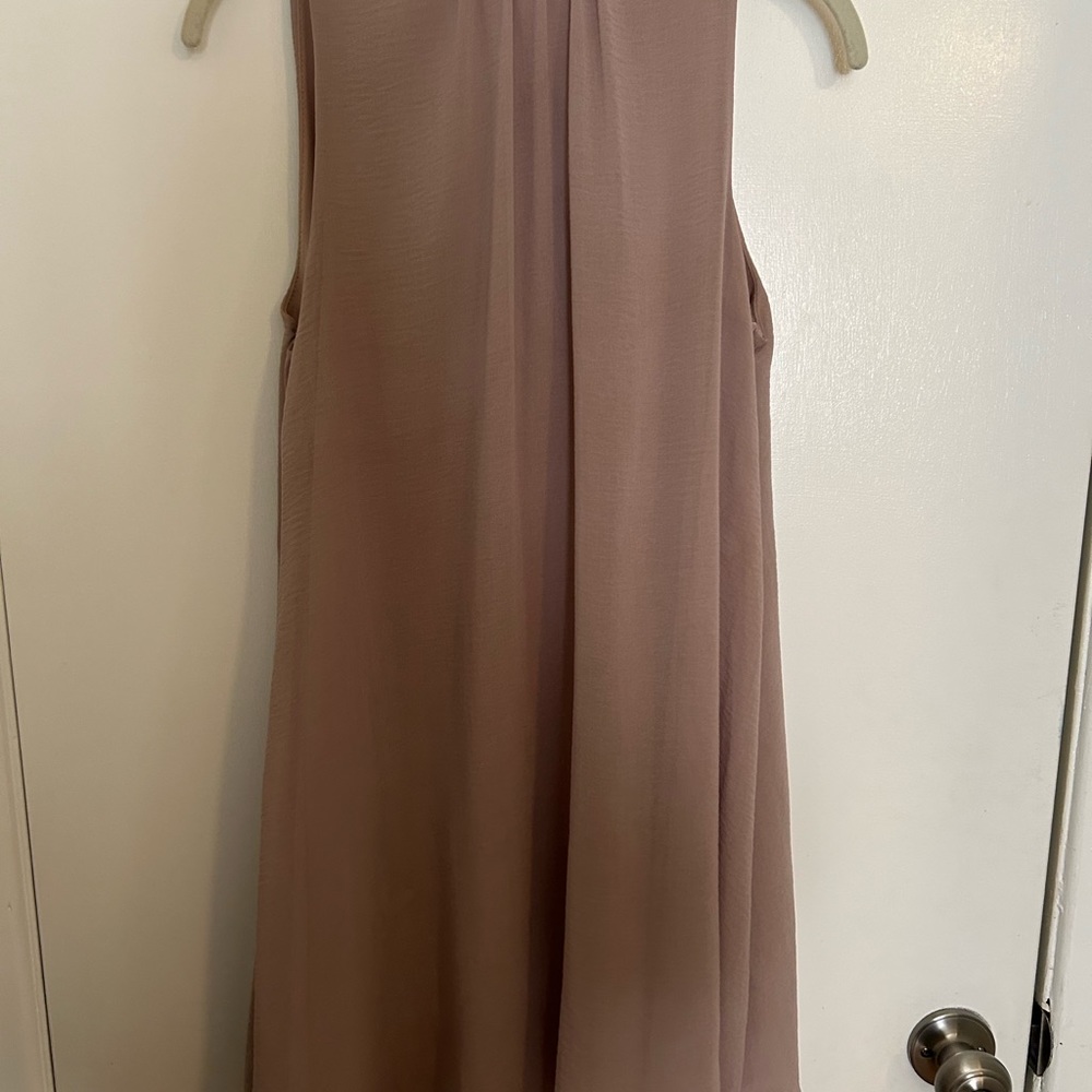Beautiful blush colored dress. MIDI length. Bow in back at neck. Size small.